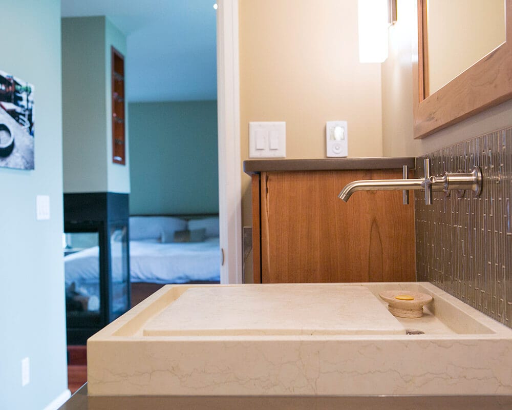 Custom bathroom and primary suite remodel, 3 sided fireplace, and walk-in primary closet by TDS Design Build.