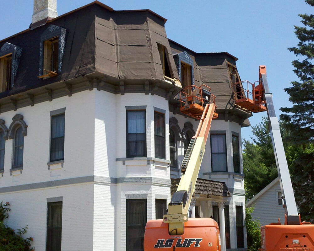 Process photograph of the historic preservation of a 1880's Second Empire Victorian home in Portage, WI.