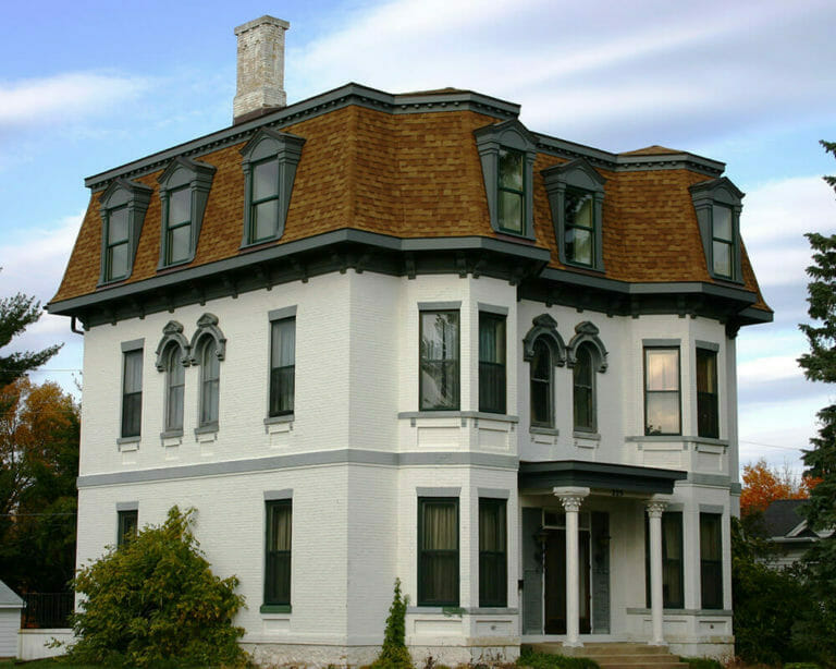 Unique historic preservation of a 1880's Second Empire Victorian home in Portage, WI by TDS Design Build.