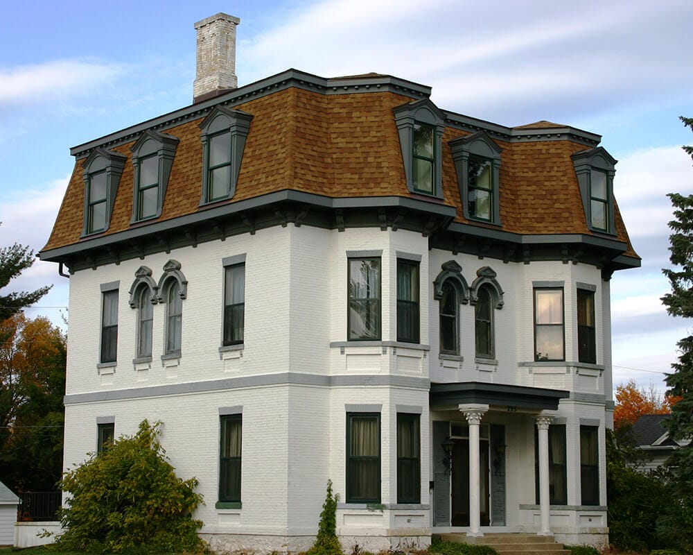 Unique historic preservation of a 1880's Second Empire Victorian home in Portage, WI by TDS Design Build.