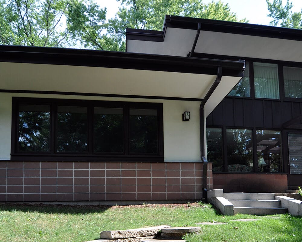 Interior functions as a den/guest room/family room in this home addition by TDS Design Build.