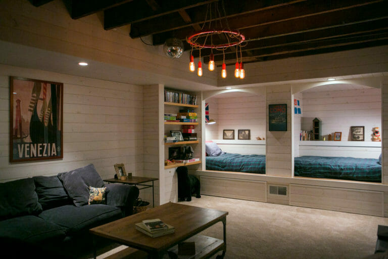 Basement remodel with play area for children and sleeping nooks in Madison, Wisconsin, by TDS Design Build.