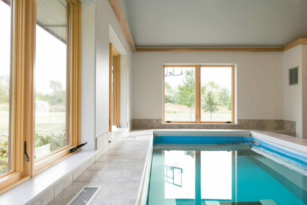 Endless Pool® addition with underwater treadmill in this new home designed for aging in place in Oregon, WI.