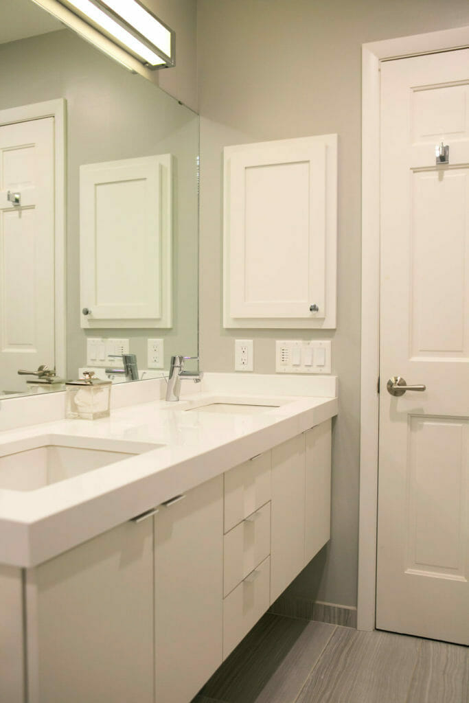 Custom kids bathroom remodel with quartz countertops and Woodharbor cabinets in Maple Bluff, Wisconsin by TDS Design Build.