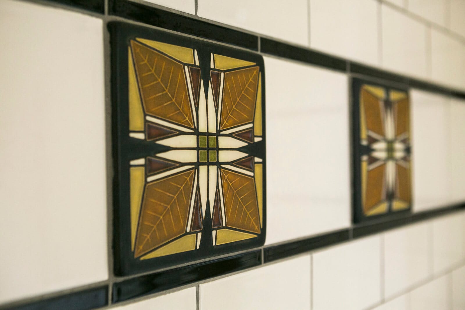 Motawi decorative bathroom shower tile in a historic renovation of a 1922 Frank Riley Colonial Revival home on the Isthmus in Madison, Wisconsin.
