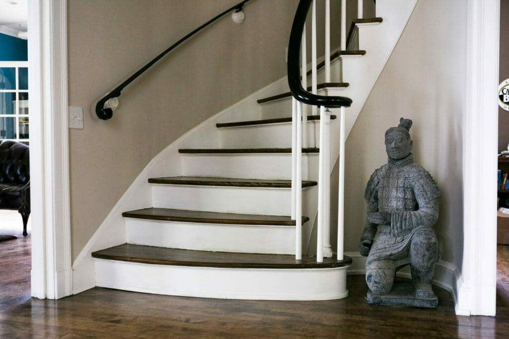 Refinished spiral staircase as part of the historic restoration of a 1922 Frank Riley Colonial Revival home in Madison, Wisconsin.