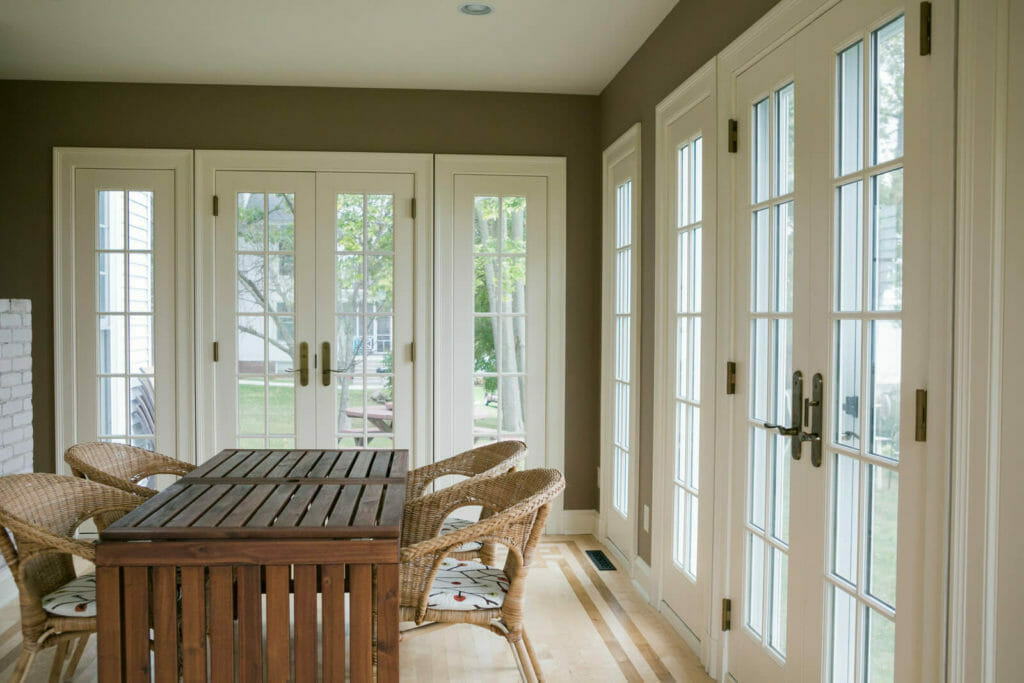 Interior of the recreated sun porch from an old photo for the historic renovation of a 1922 Frank Riley Colonial Revival home on the Isthmus in Madison, Wisconsin.