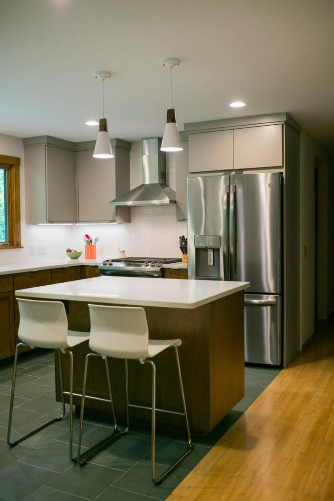 Contemporary near-west Madison kitchen remodel with pendant lights, WoodHarbor cabinets, and quartz countertops, designed and built by TDS Custom Construction.